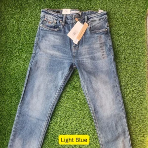 CK (Taper Fit Jeans)